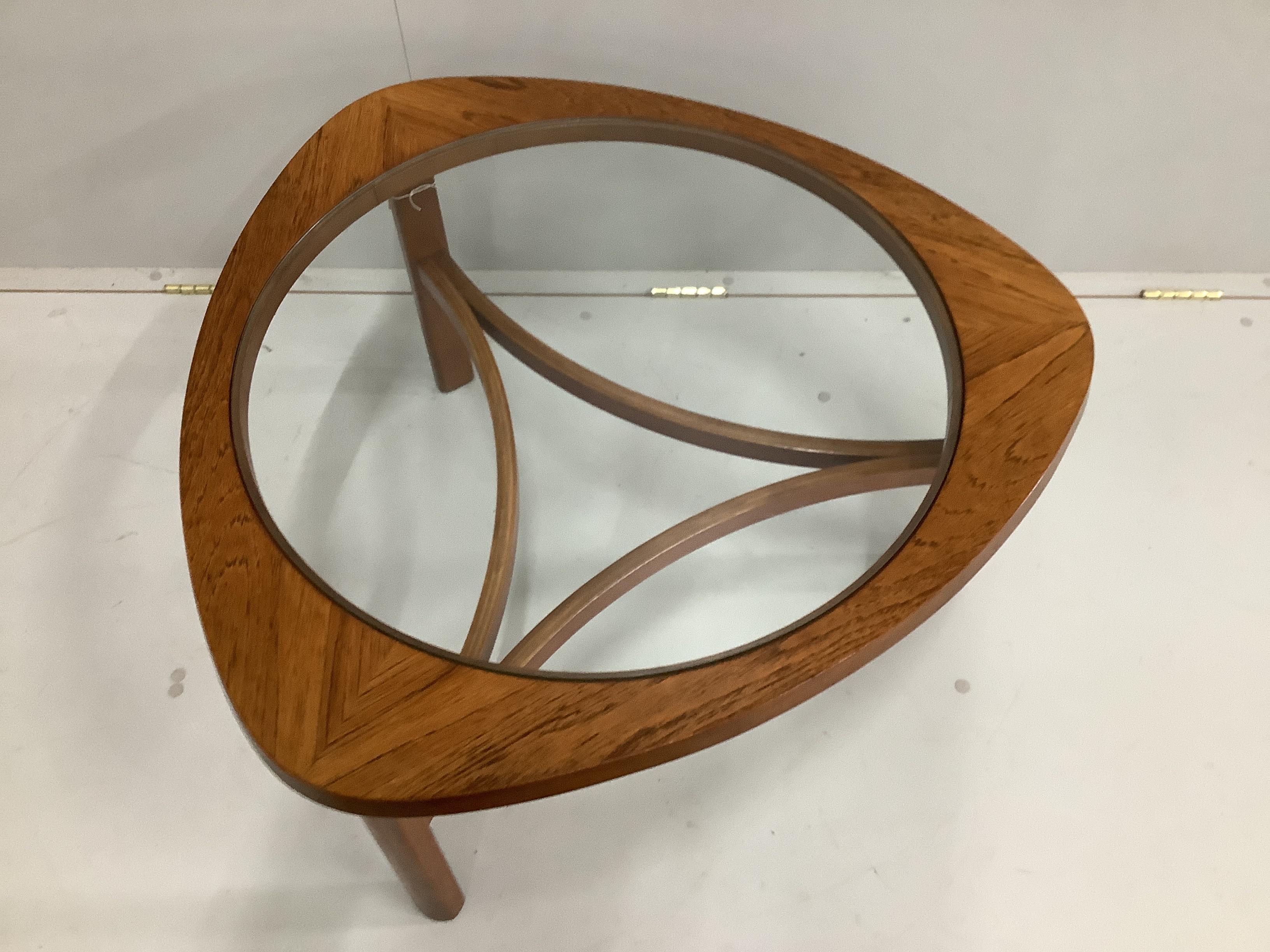 A Nathan Furniture mid century teak glass top coffee table, width 77cm, height 44cm